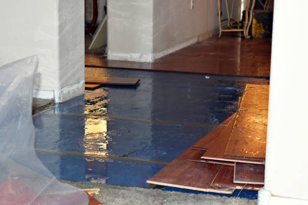 Professional Flood Cleanup technician working in Pascoag, RI
